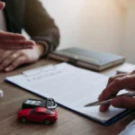A consumer reviewing a vehicle service protection contract to verify coverage details and exclusion lists before purchasing.