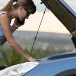 Aging car with hood up